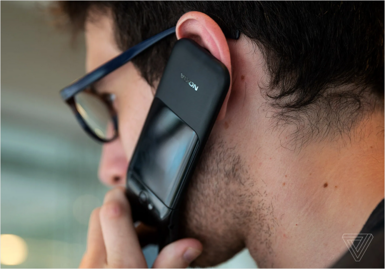 Trader using Nokia 2720 Flip